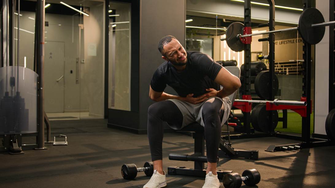 A person sitting on a chair in a gym
AI-generated content may be incorrect.